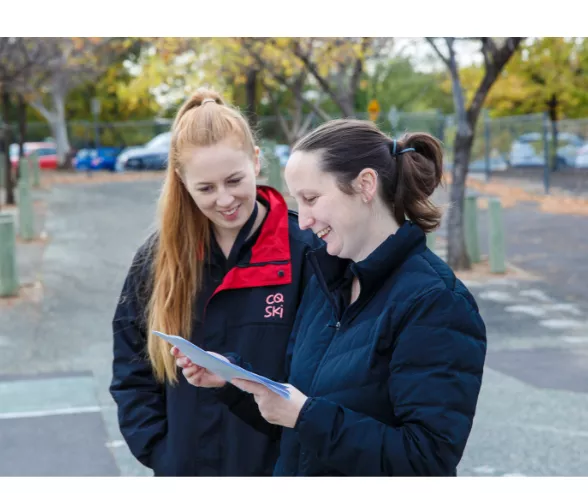 Two educators in discussion