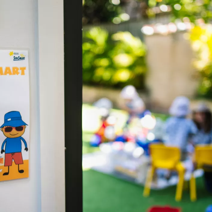 Be Sun Smart poster and children outside